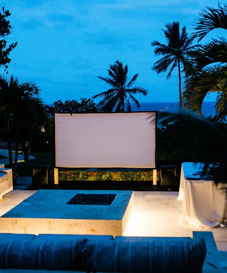 A projector screen sitting on top of a patio.