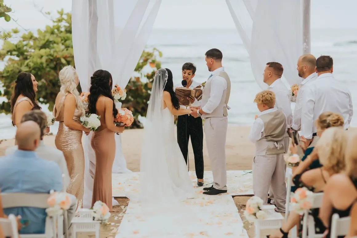 A couple getting married at the beach